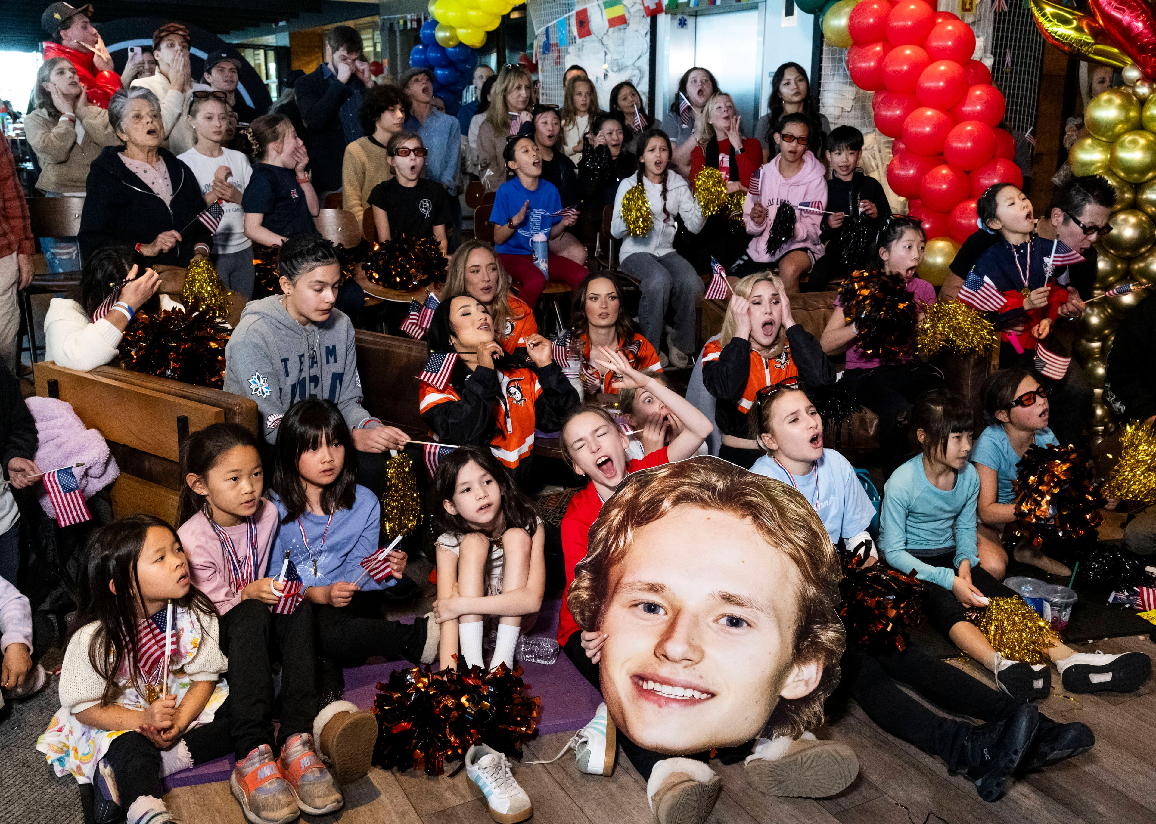 Fans in Irvine cheer skaters who train locally at Olympic watch party